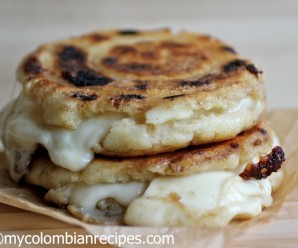 Cheese Stuffed Corn Cakes (Arepas Rellenas de Queso) |mycolombianrecipes.com