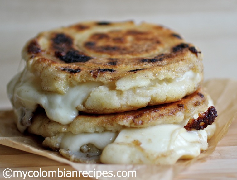 Cheese Stuffed Corn Cakes (Arepas Rellenas de Queso) |mycolombianrecipes.com
