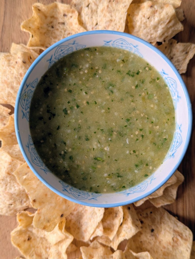 Green and fresh homemade Tomatillo Salsa with chips