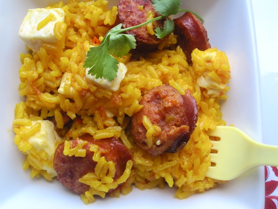 Arroz Clavado (Rice with Smoked Sausage and White Cheese