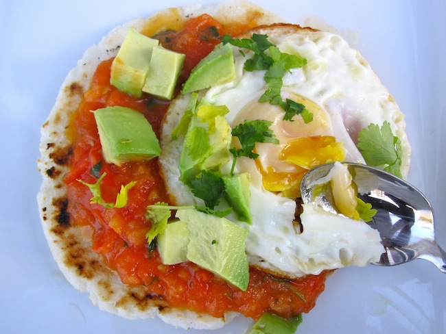 Arepa with egg, hogao and aguacate