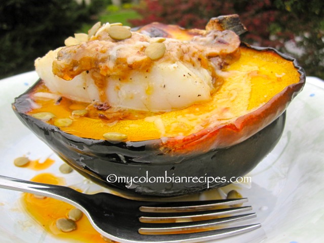 Spicy Cod Fillet with Coconut-Squash Sauce Over Roasted Acorn Squash