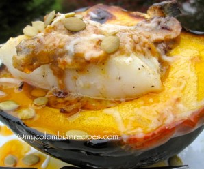 Spicy Cod Fillet with Coconut-Squash Sauce Over Roasted Acorn Squash