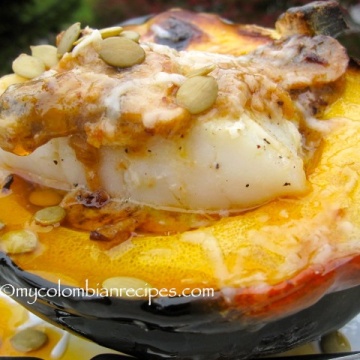 Spicy Cod Fillet with Coconut-Squash Sauce Over Roasted Acorn Squash