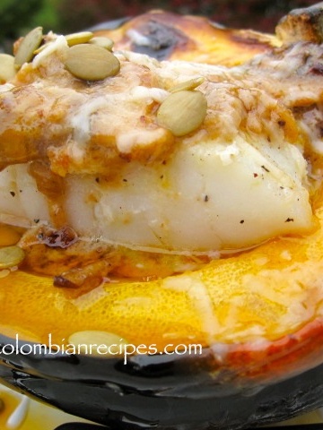 Spicy Cod Fillet with Coconut-Squash Sauce Over Roasted Acorn Squash