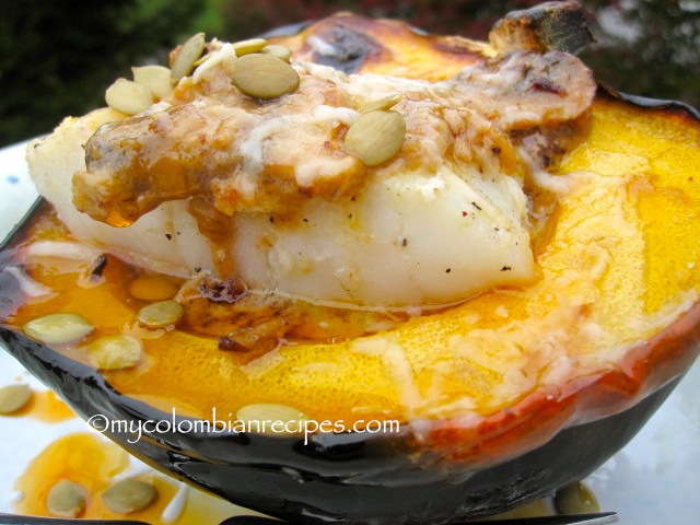 Spicy Cod Fillet with Coconut-Squash Sauce Over Roasted Acorn Squash