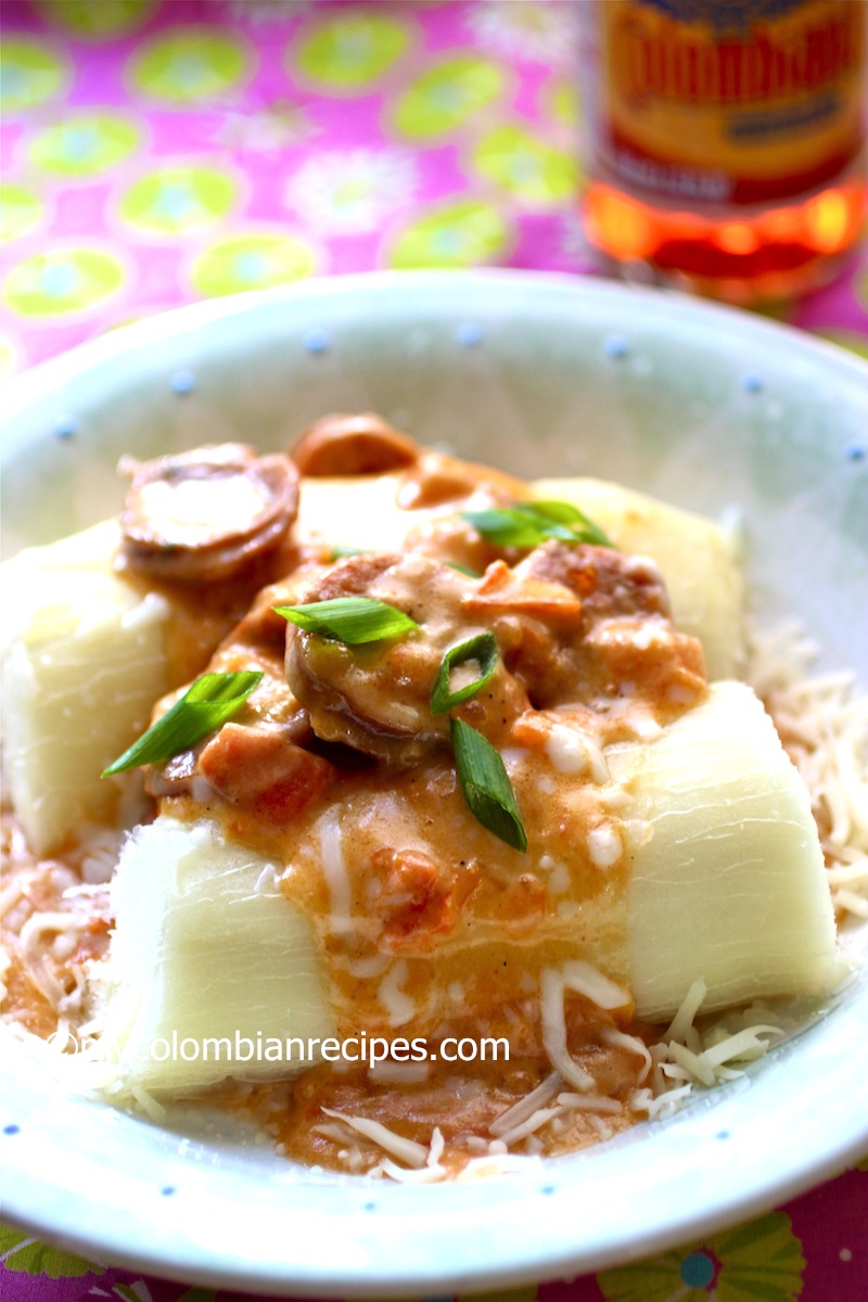 (Cassava with Chorizo and Cheese Sauce)