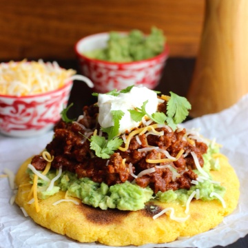 Arepas with Beef Chili, Guacamole and Cheese |mycolombianrecipes.com