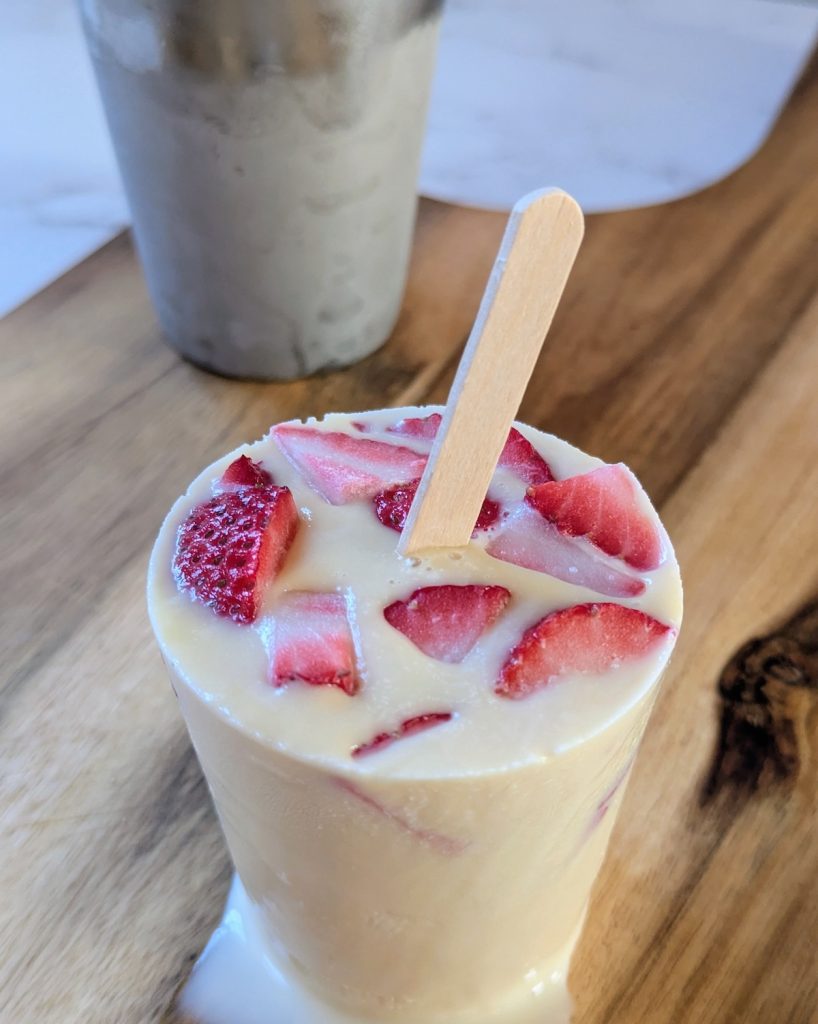Strawberries and Cream Popsicles with Fruit Chuncks and Creamy